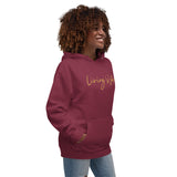 Woman Wearing A Maroon Living Water Eternal Life Hoodie , Front View