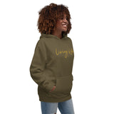 Woman Wearing A Living Water Eternal Life Hoodie In Military Green, Front View
