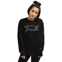 Woman Wearing A Black Truth Sweatshirt