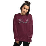 Front View Of A Woman Wearing A Maroon Truth Sweatshirt