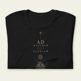 Folded black t-shirt with AD MAIOREM DEI GLORIAM and IHS symbol