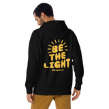 Man Wearing A Black Be The Light Hoodie
