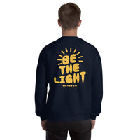 Man Wearing A Be The Light Sweatshirt In Navy