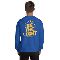 Man Wearing A Royal Blue Be The Light Sweatshirt