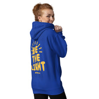 Woman Wearing A Be The Light Hoodie