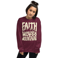 Woman Wearing A Maroon Faith Moves Mountains Sweatshirt