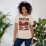 Woman Wearing A Cream Faith Can Move Mountains T-shirt