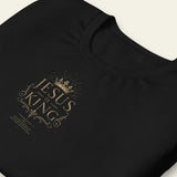 Black t-shirt with 'Jesus is King' text and crown design