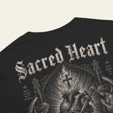 Black t-shirt with 'Sacred Heart' design featuring a heart, cross, and angels 