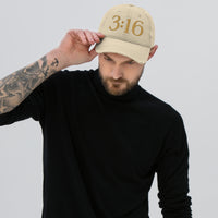 Man Wearing A Khaki John 3:16 Hat