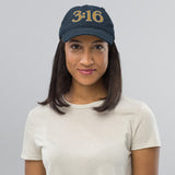 Woman Wearing a Navy John 3:16 Hat