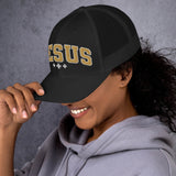 Woman Wearing A Jesus Trucker Hat