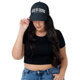 Woman Wearing a Navy God Is Good All The Time Trucker Hat
